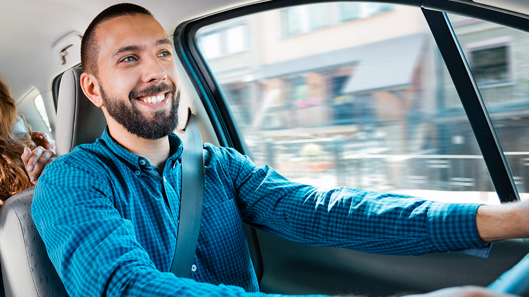 Happy man driving